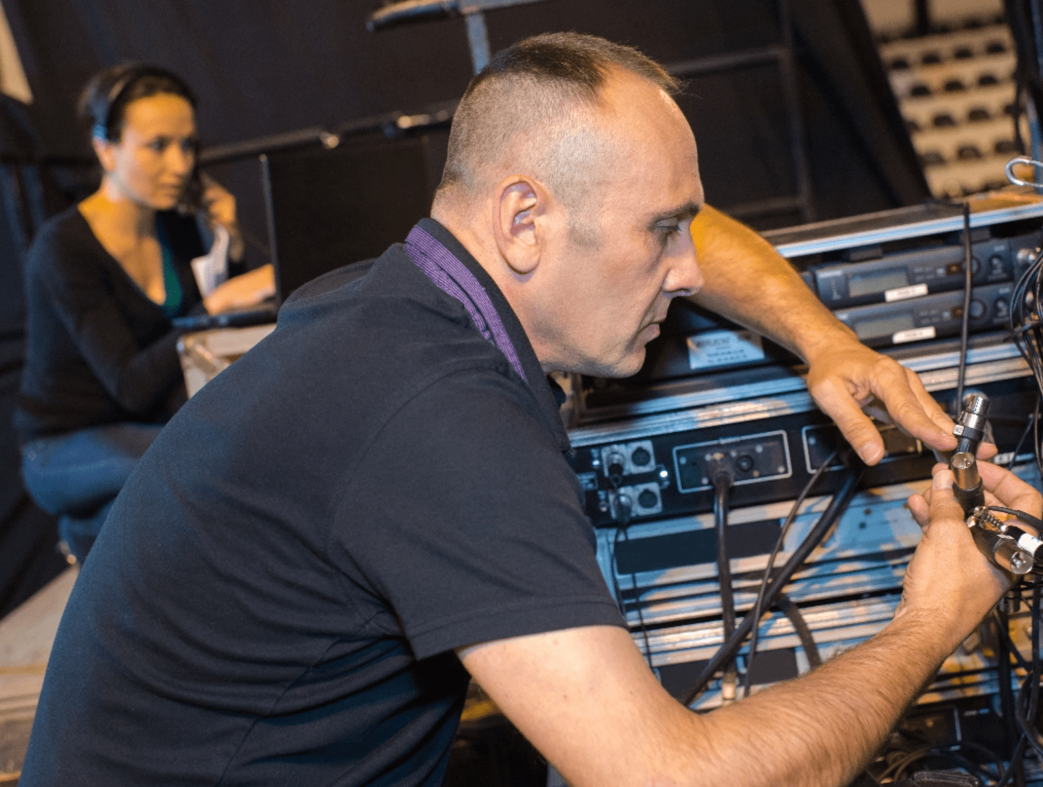 Golden West Sound Design Man Adjusting Equipment